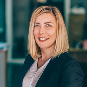 Оксана Мельникова — менеджер по работе с клиентам NM Economista